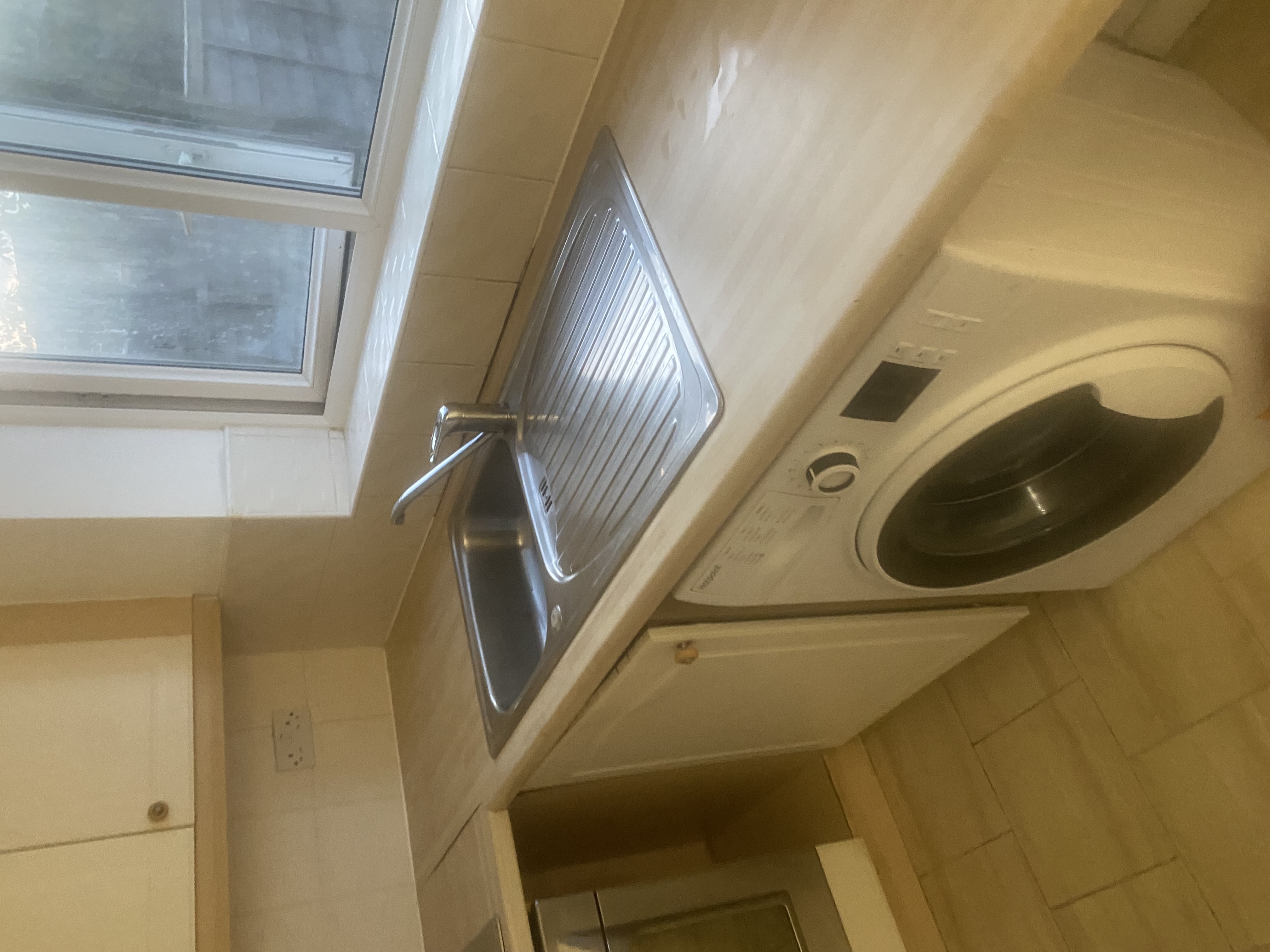 Kitchen sink area after cleaning