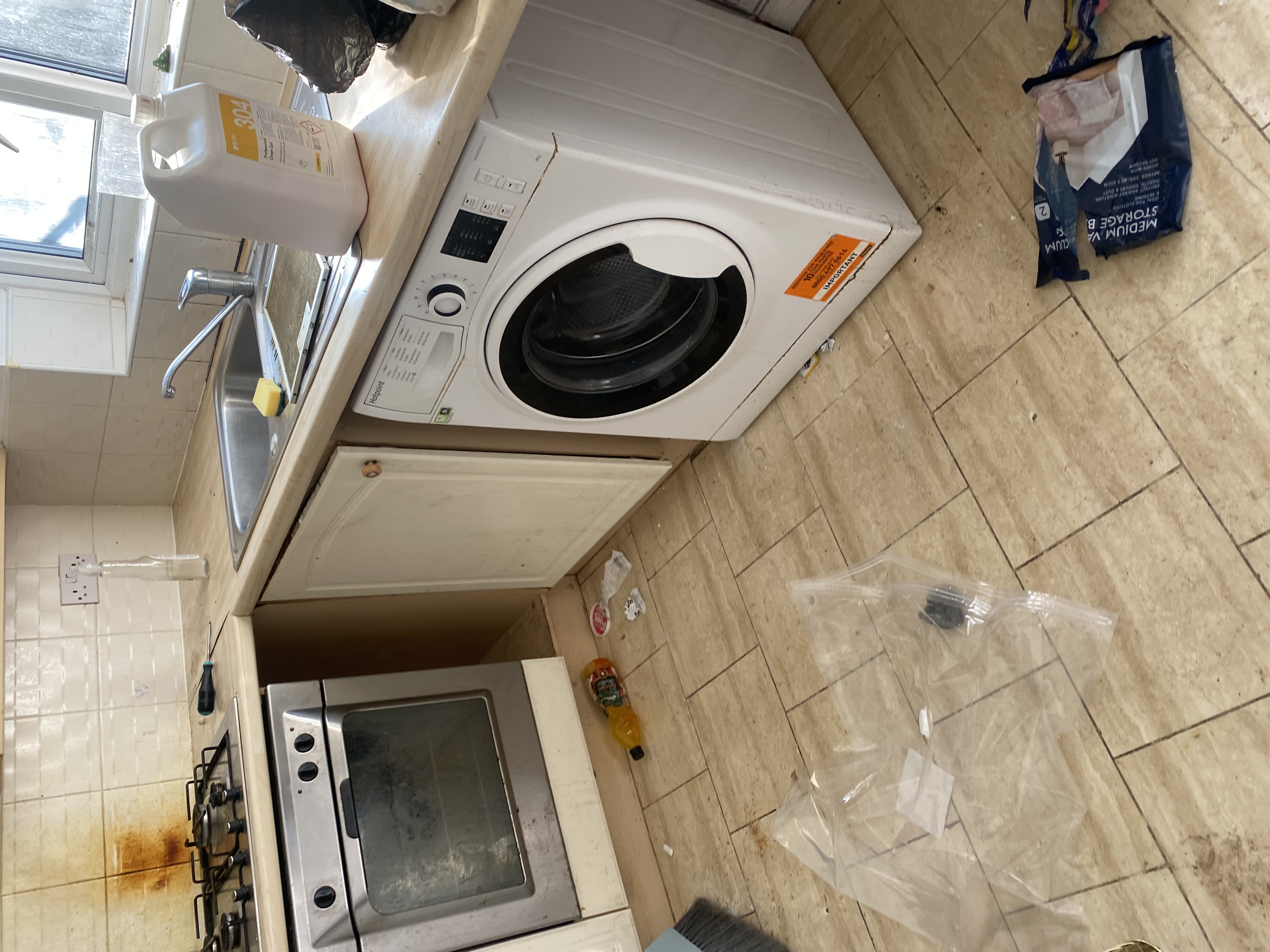 Kitchen sink area before cleaning